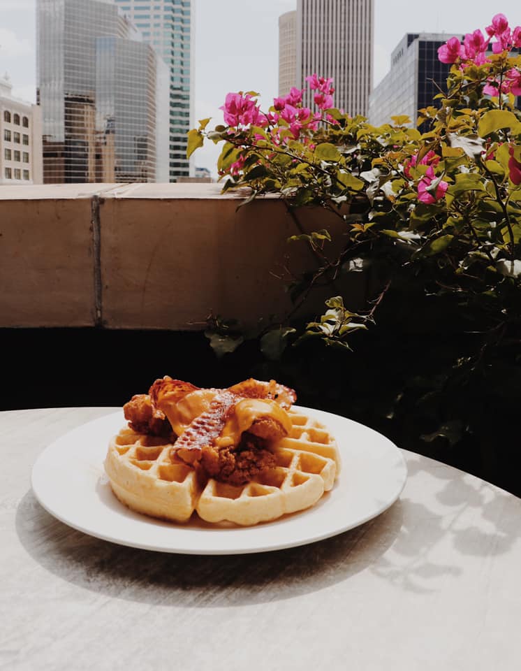 Image of chicken and waffles during brunch at The Attic Cafe