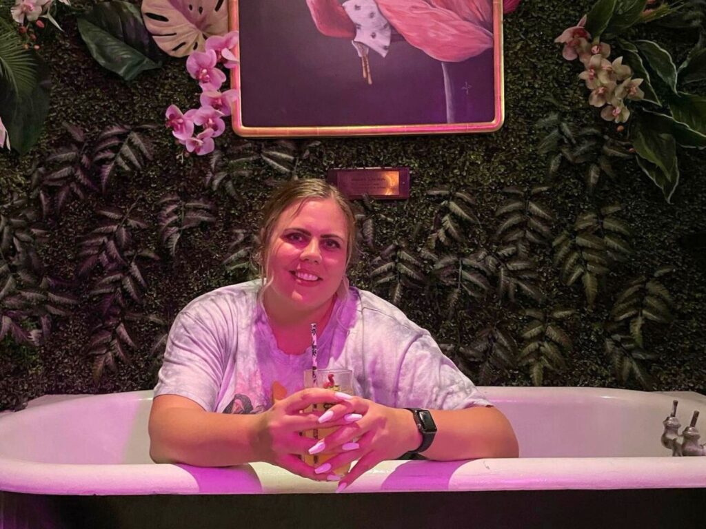 Molli poses inside The Instagram Famous Bathtub at Mandarin Heights