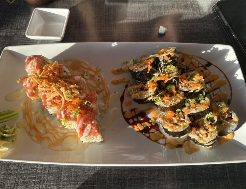 A plate of two different sushis from Pisces Sushi and Global Bistro
