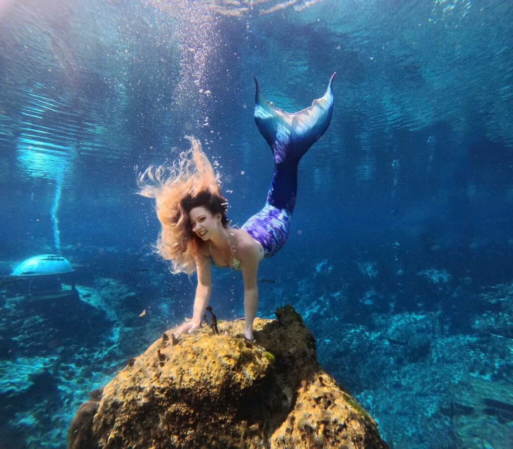 mermaid performer poses during Mermaid Show at Weeki Wachee Springs - @weekiwacheesprings