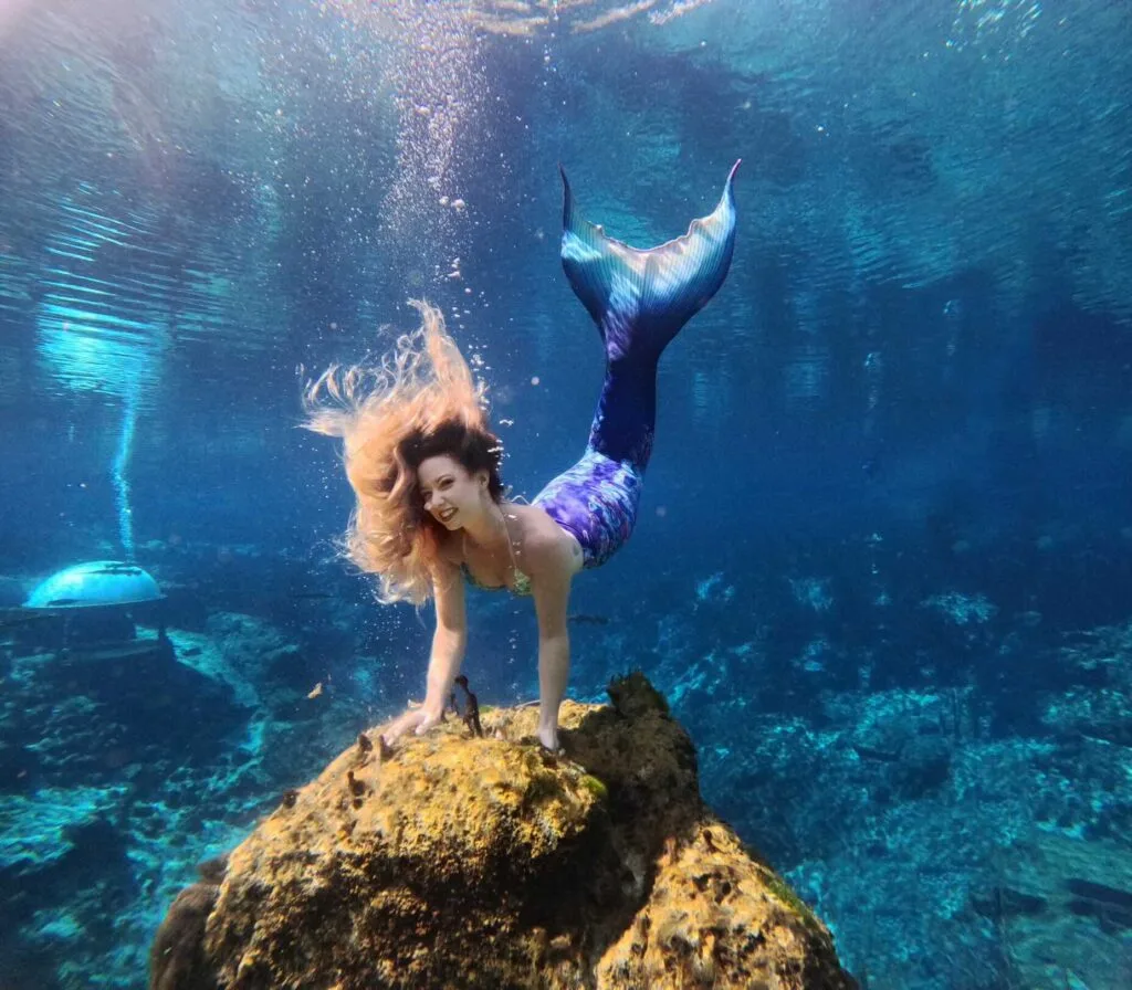 mermaid performer poses during Mermaid Show at Weeki Wachee Springs - @weekiwacheesprings