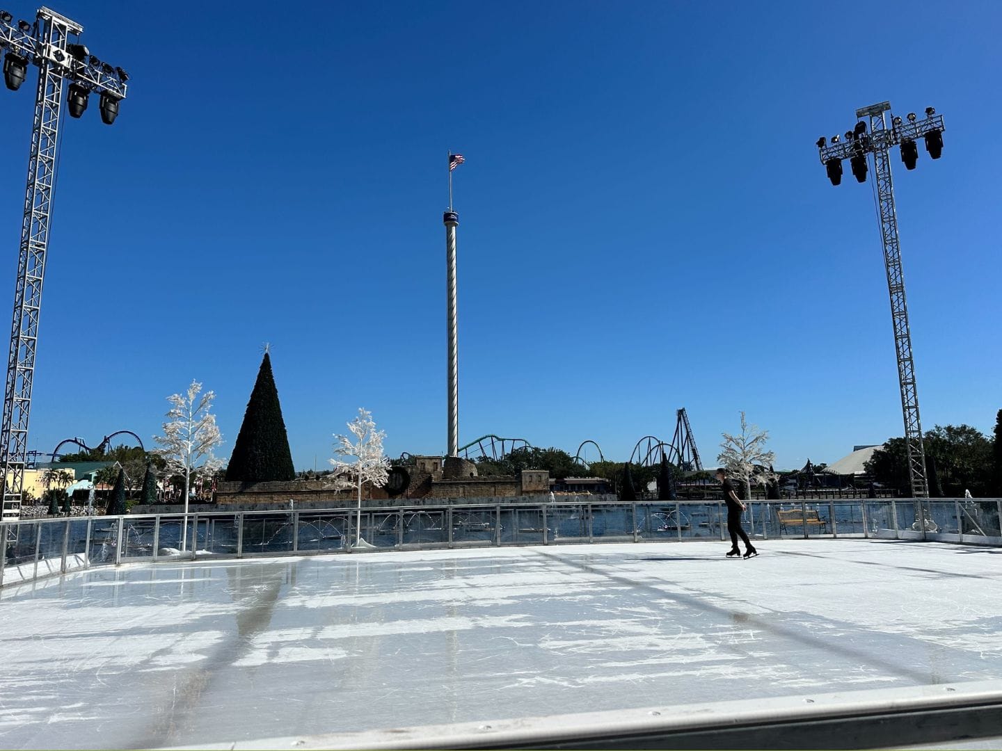 one man on rink Ice Skating at SeaWorld Orlando theme park - image by Dani Meyering