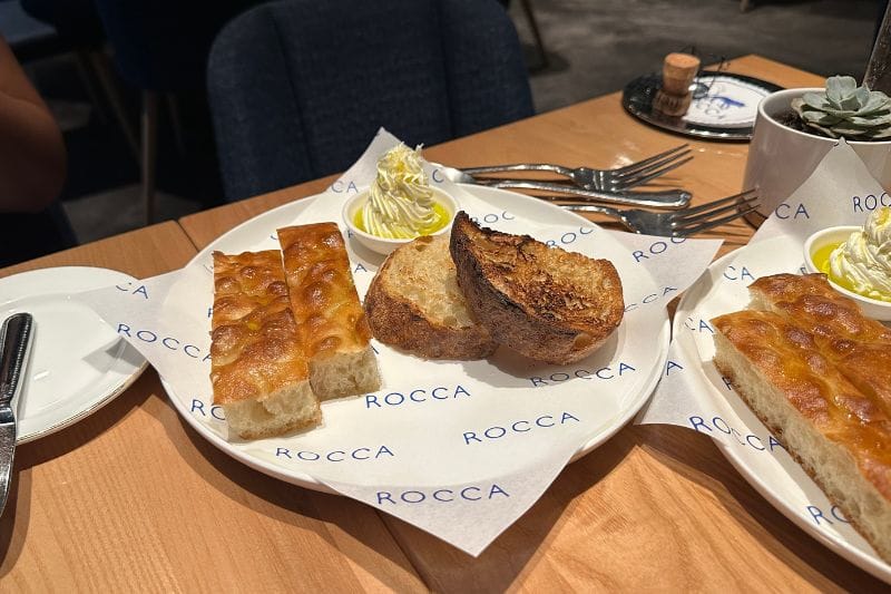 The Bread starter, featuring focaccia and sourdough, from Rocca, a Michelin Star restaurant in Tampa, FL.