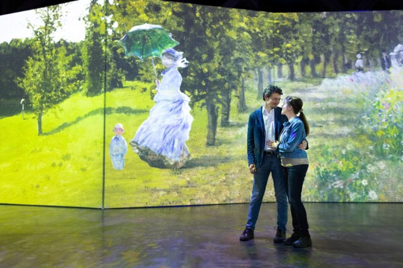 A couple at Experience Monet