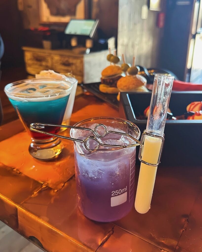 Scarab Beetle Essence Cauldron Cooler drinks at Halloween Hangar Bar Disney Springs - image by Dani Meyering square