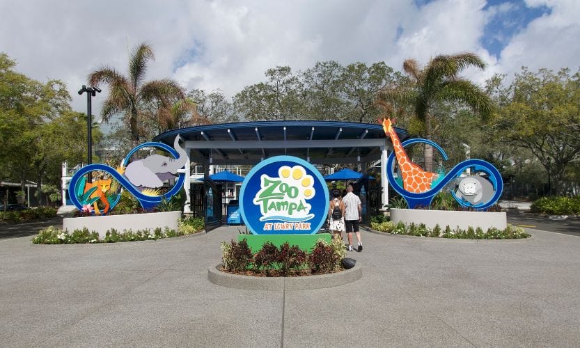 ZooTampa entrance sign featuring an elephant, giraffe, manatee, and more!