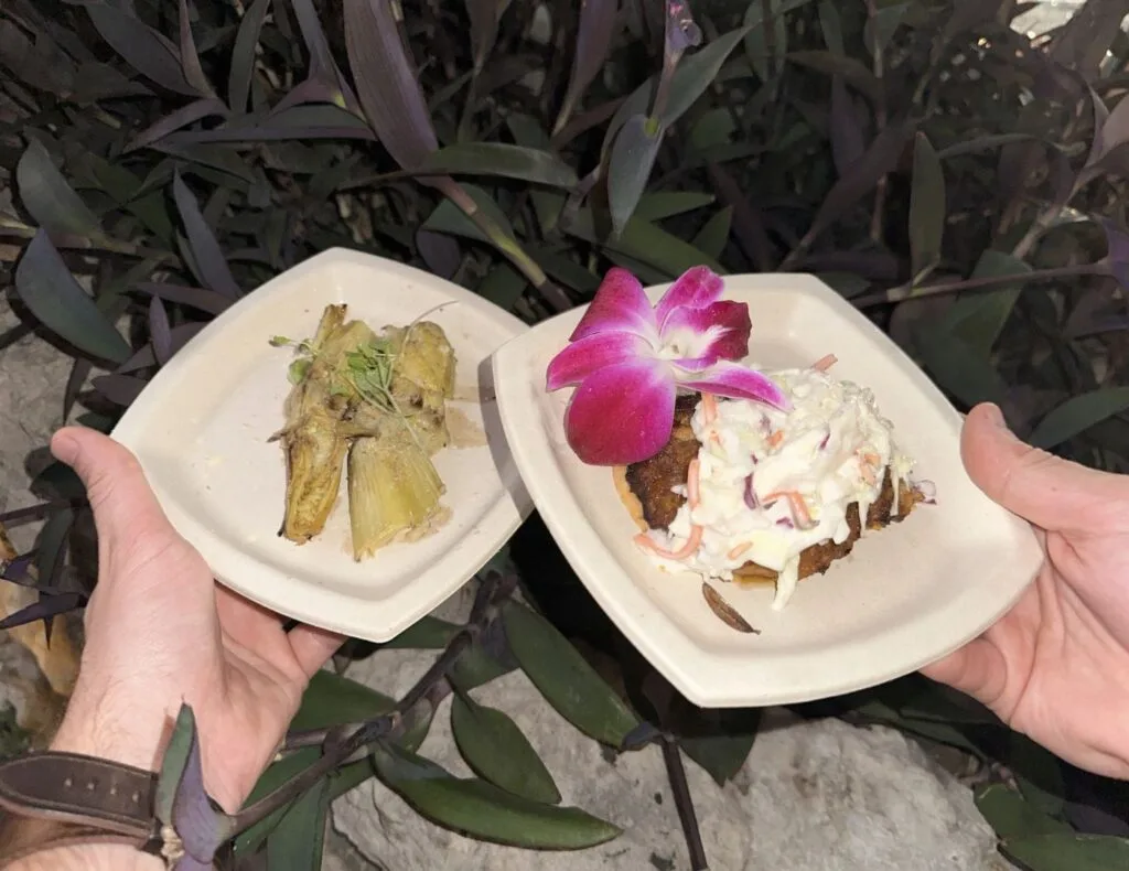 Grilled Baby Artichokes and Crab Corn Cakes Food Wine & Garden Festival in front of a cute greenery background