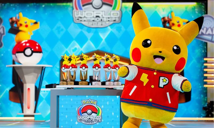 Pikachu Pokémon on stage with award statues featuring a pokéball and Pikachu at the 2025 World Championships