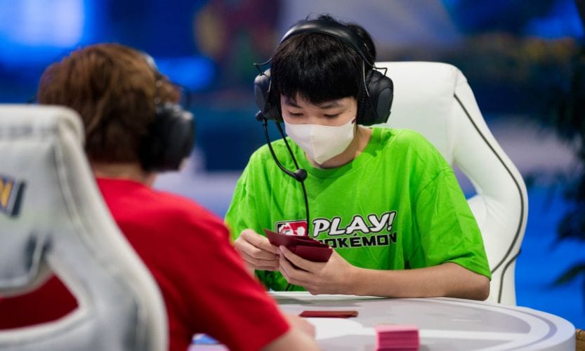 A close of up image of two Pokémon TCG players battling it out on stage