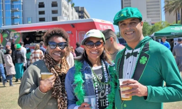 People in St. Patrick's Day-themed outfits in downtown Tampa!