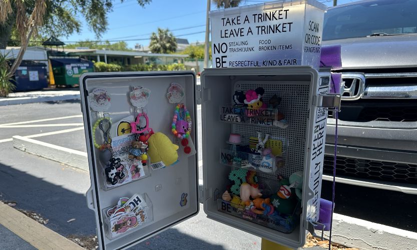 A trinket trade box outside of StrangeCat Toys, one of the collectable shops in Tampa