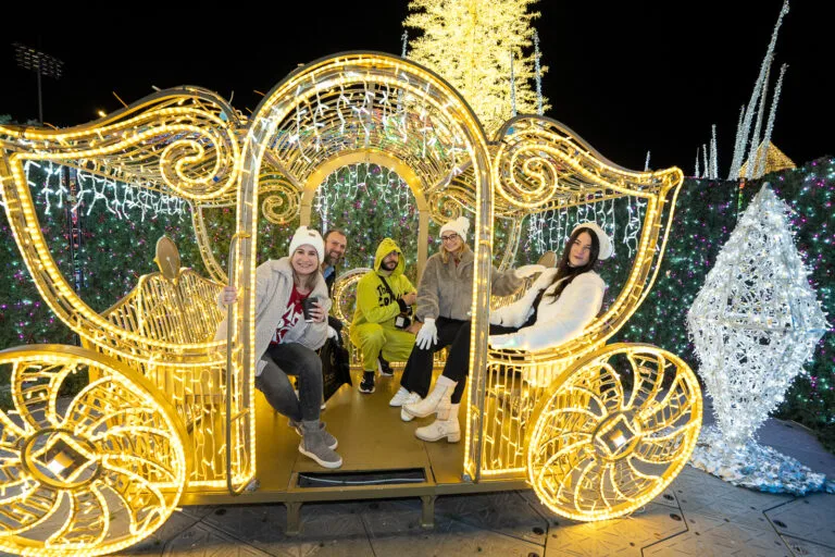 Enchant Christmas in St. Pete featuring a carriage made of lights