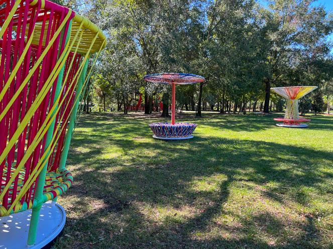 colorful play equipment at Los Trompos section of Bonnet Springs Park - Laura Byrne