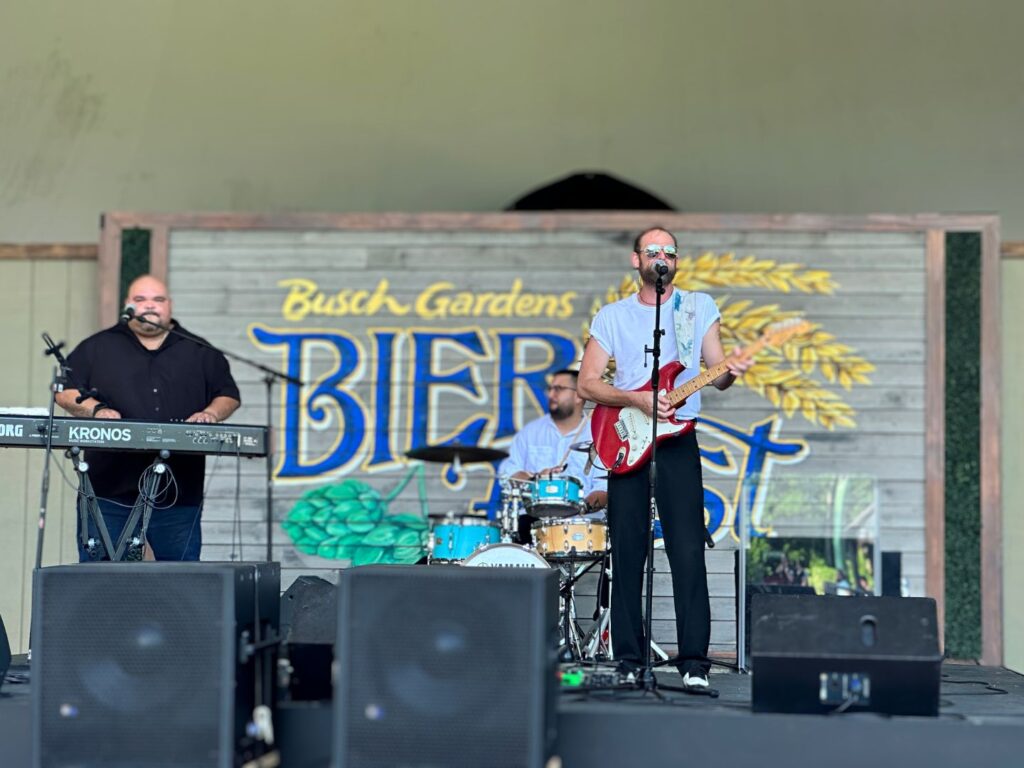 a 3 member band provides Live Music at Busch Gardens Bier Fest 